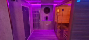 Golden Crown spa suite with private hot tub and thermal suite